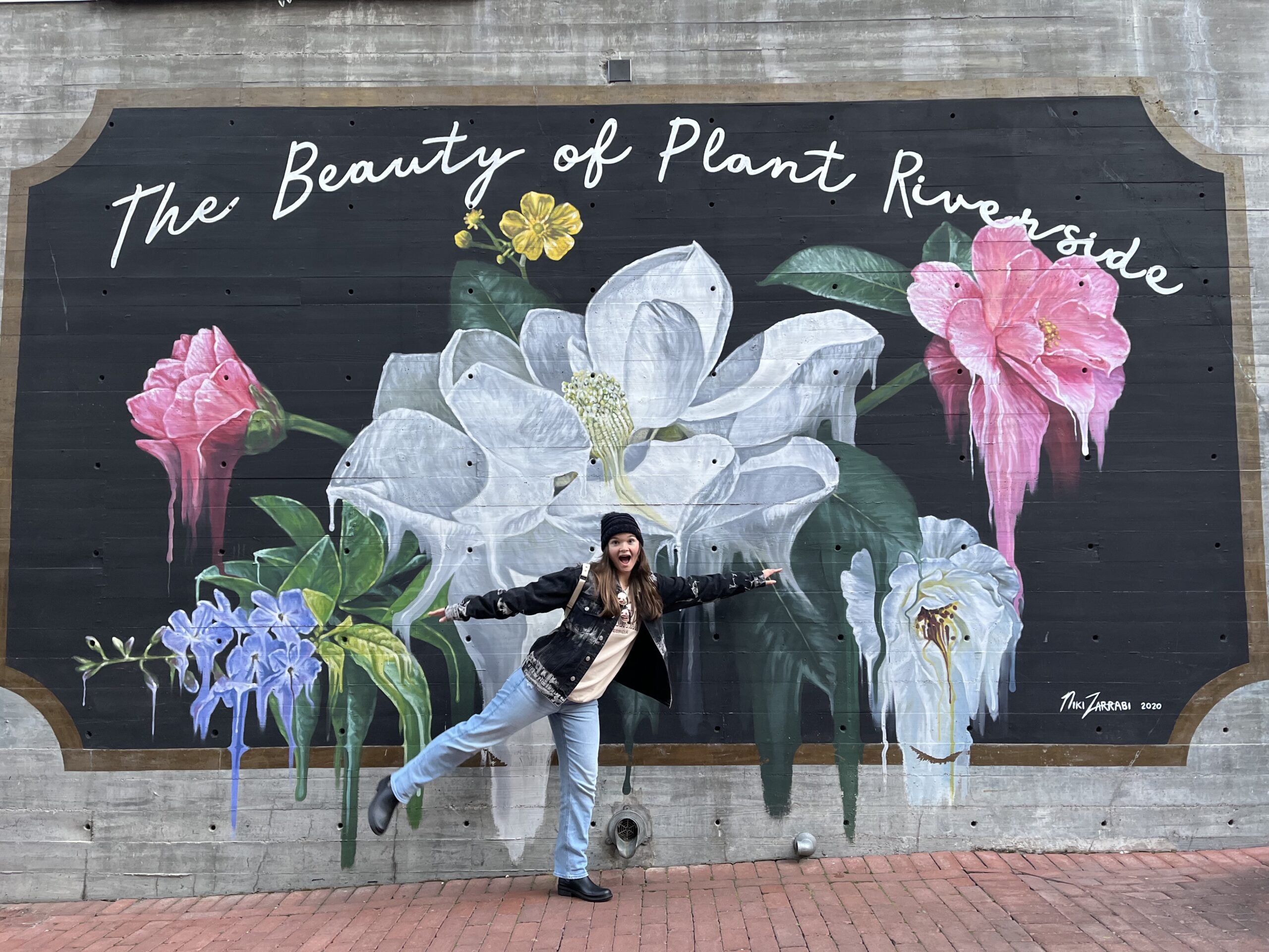 Picture of Tiffani infant of a floral mural